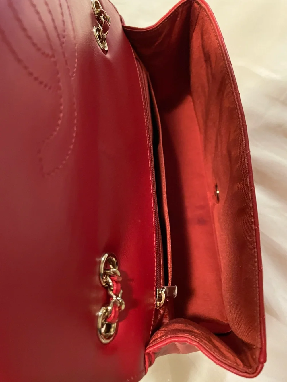 CHANEL Red Quilted Chevron Shoulder Bag with Gold CC Lock